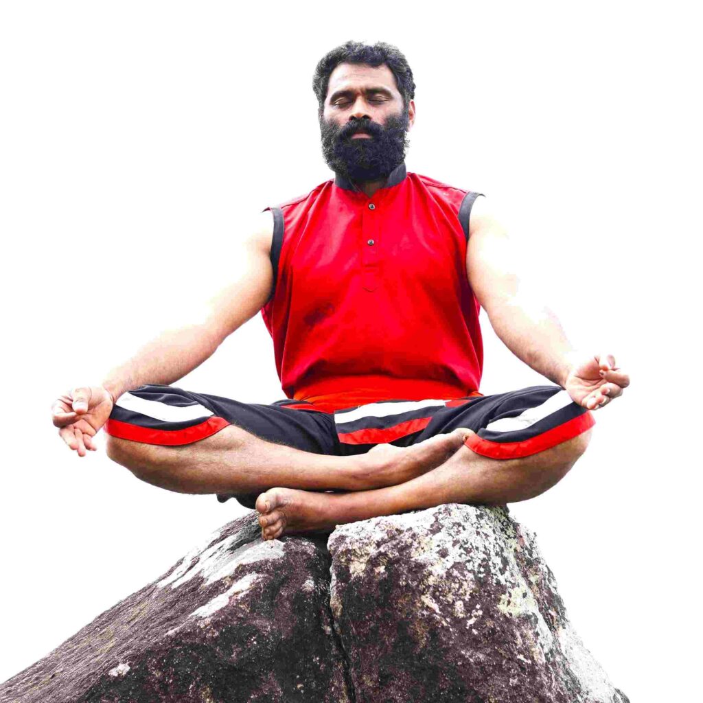 Traditional master K.F. Thomas Gurukkal during a meditation session, an essential part of authentic kalaripayattu training kerala.